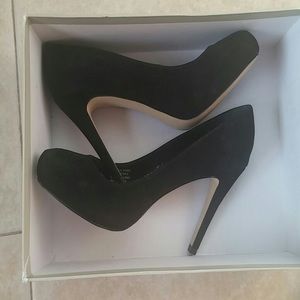 Brand new class is black suede heels